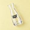 Glazen notenkaraf 250 ml schuin gefotografeerd met De Notenshop logo