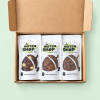 Geopend geschenkpakket chocolade zomaar met drie zakjes chocolade