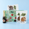 Luxe kerst geschenkdoos met prosecco, champagneglas, nootjes en chocolade