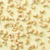 Maple roasted cashewnoten los over de achtergrond