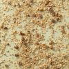 Havermuesli pecan & hazelnoot los verspreid over een lichtgroene achtergrond