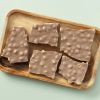 Chocolade hazelnoot breekplaat in stukken
