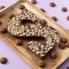 Chocoladeletter S Melk / Hazelnoot (225 gram) met kruidnoten