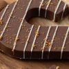 Chocoladeletter S speculoos (200 gram) met vulling en kruimels