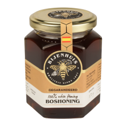 Glazen pot Bos-honing van Bijenhuis met witte achtergrond