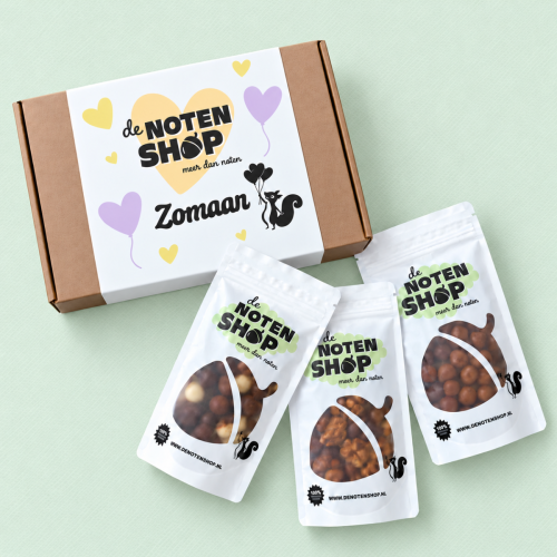 Geschenkpakket chocolade zomaar met drie zakjes chocolade en cadeaubox Geschenkpakket chocolade zomaar met drie zakjes chocolade en cadeaubox
