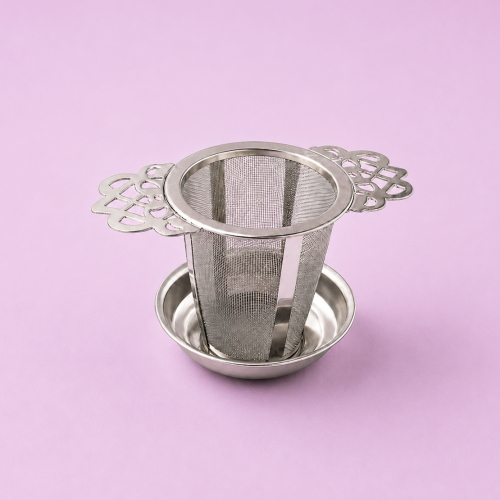 Royal Tea theezeefje op paarse achtergrond